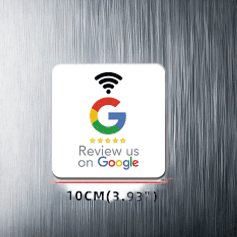 A square sign with a Wi-Fi symbol above the Google logo reads, "Review us on Google." Below the sign is a measurement of "10CM(3.93'')." The background of the image is a metallic surface with vertical lines.