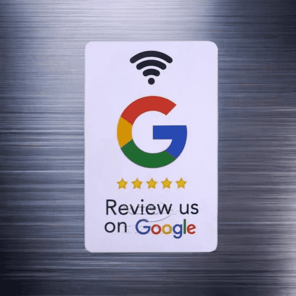 A sign on a brushed metal background displays the Google logo with five gold stars below it. Underneath the stars, text reads "Review us on Google." There is also a Wi-Fi symbol above the logo.